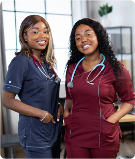 two nurses smiling